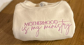Motherhood Is Ministry Embroidered Apparel